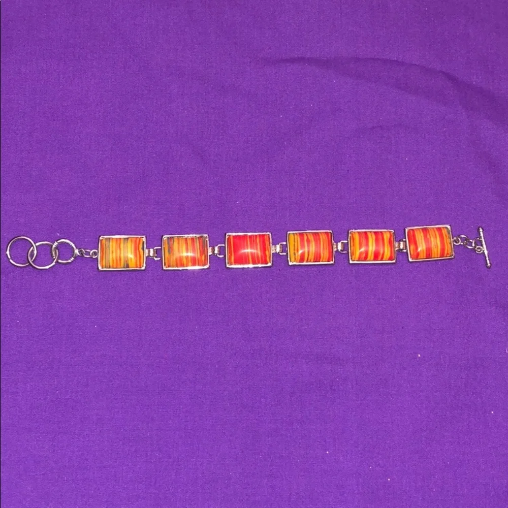 Orange resin striped bracelet 8”‎